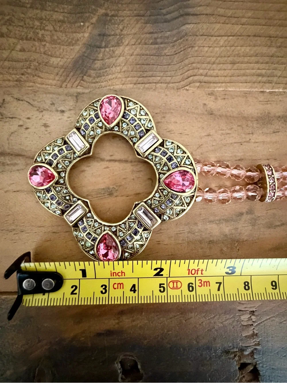 HEIDI DAUS PINK BEADED CRYSTAL NECKLACE FEATURING A QUATREFOIL-SHAPED PENDANT